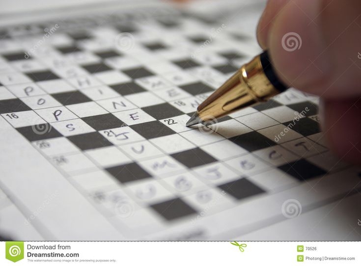 Crossword Solving A Crossword Puzzle Focus On Pen S Tip Sponsored 